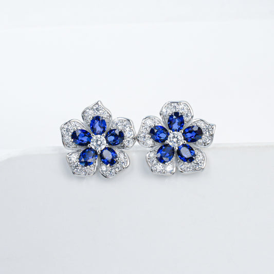 925 Sterling Silver Flower Stud Earrings, Oval Cut Lab Grown Blue Sapphire Earrings with Pave CZ
